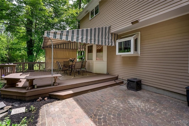 20 Dan Troy Dr, Amherst, NY 14221 - wooden deck featuring outdoor dining space and a patio