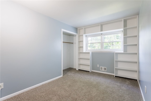 32 Princess Dr, Henrietta, NY 14623 - unfurnished bedroom featuring carpet floors and a closet