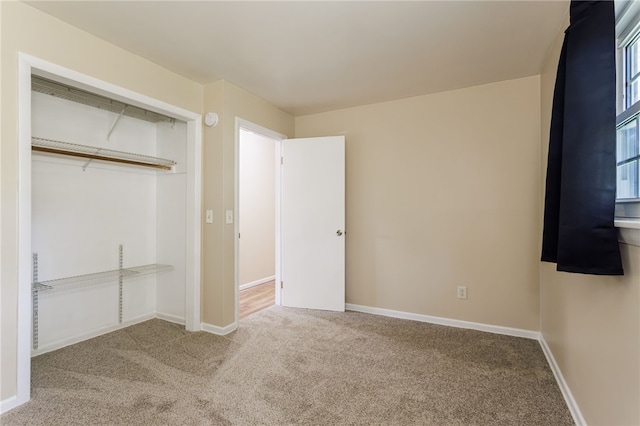32 Princess Dr, Henrietta, NY 14623 - unfurnished bedroom featuring carpet and a closet