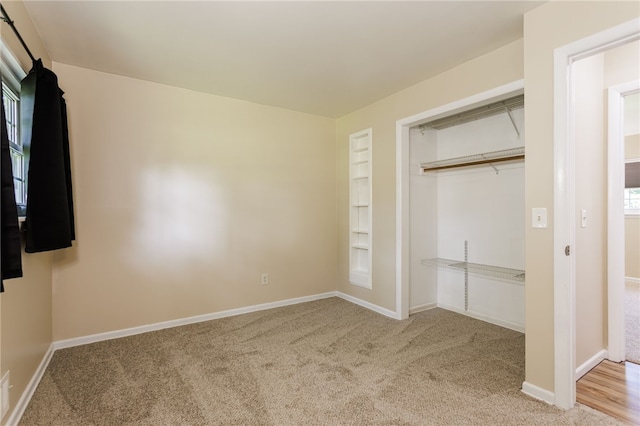 32 Princess Dr, Henrietta, NY 14623 - unfurnished bedroom featuring carpet flooring and a closet