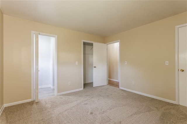 32 Princess Dr, Henrietta, NY 14623 - unfurnished bedroom featuring carpet flooring and baseboards