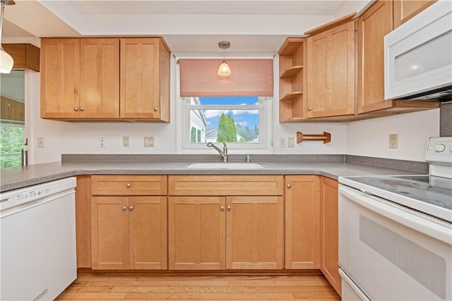 39 Southwind Ct, Greece, NY 14626 - kitchen featuring white appliances, healthy amount of natural light, light wood-style flooring, and decorative light fixtures