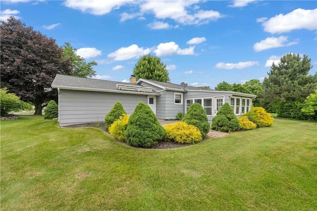 39 Southwind Ct, Greece, NY 14626 - back of house with a lawn