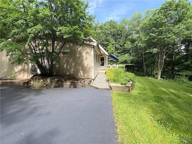 1708 Bonney Rd, Hamilton, NY 13346 - view of side of property with a lawn and a patio area