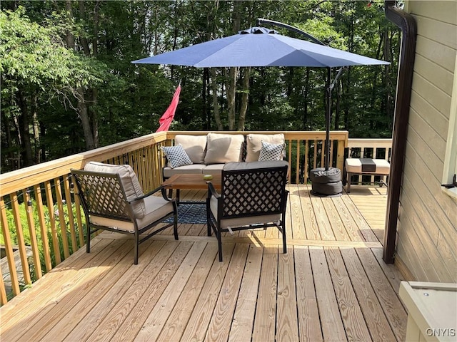 1708 Bonney Rd, Hamilton, NY 13346 - deck featuring an outdoor hangout area and view of wooded area