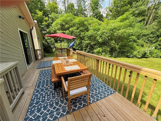 1708 Bonney Rd, Hamilton, NY 13346 - wooden deck featuring outdoor dining area and view of scattered trees