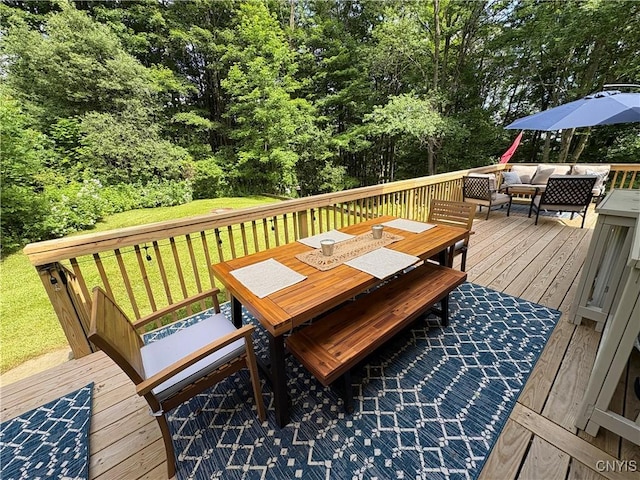 1708 Bonney Rd, Hamilton, NY 13346 - wooden deck with outdoor dining space, a yard, and an outdoor living space