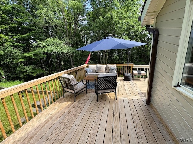 1708 Bonney Rd, Hamilton, NY 13346 - wooden terrace with an outdoor hangout area and view of scattered trees