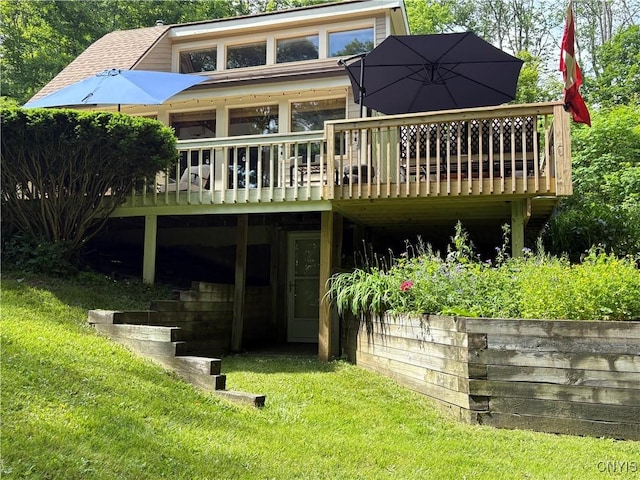 1708 Bonney Rd, Hamilton, NY 13346 - rear view of house featuring a wooden deck and a lawn