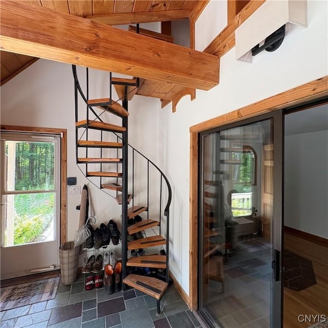 1708 Bonney Rd, Hamilton, NY 13346 - staircase with vaulted ceiling and stone finish flooring