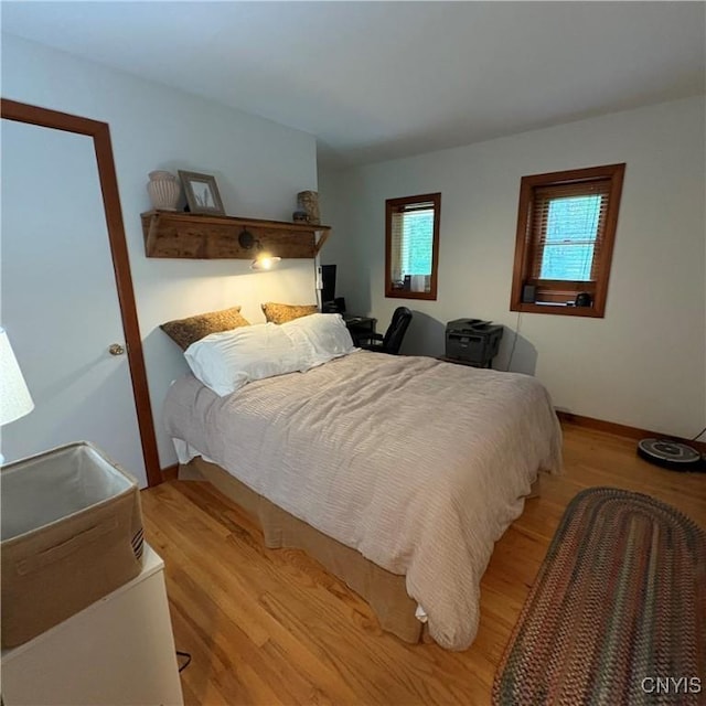 1708 Bonney Rd, Hamilton, NY 13346 - bedroom featuring light wood-style floors and baseboards