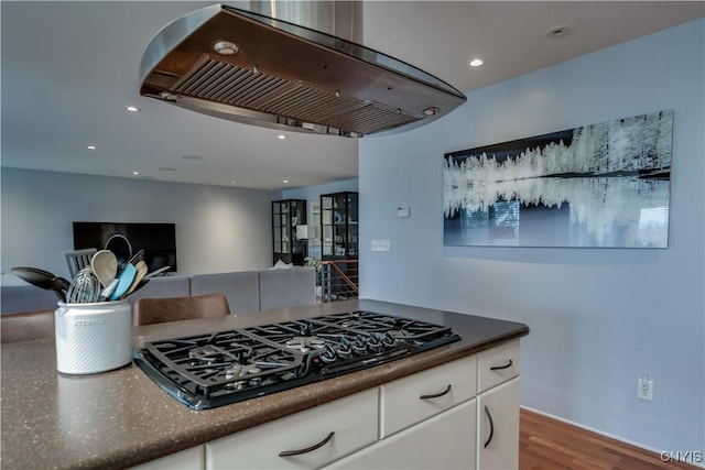 1348 Sunset Rdg, Watertown-Town, NY 13601 - kitchen with black gas stovetop, range hood, wood finished floors, white cabinetry, and recessed lighting