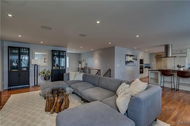 1348 Sunset Rdg, Watertown-Town, NY 13601 - living area featuring light wood-type flooring and recessed lighting