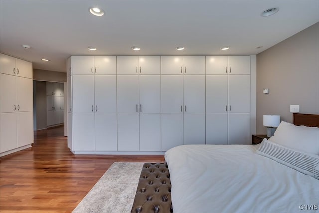 1348 Sunset Rdg, Watertown-Town, NY 13601 - bedroom with wood finished floors and recessed lighting