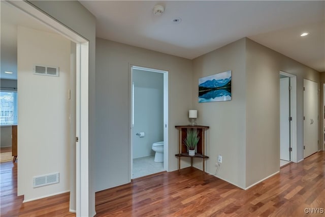 1348 Sunset Rdg, Watertown-Town, NY 13601 - hallway featuring light wood finished floors and recessed lighting