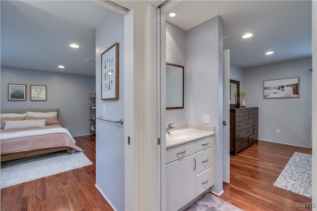 1348 Sunset Rdg, Watertown-Town, NY 13601 - bedroom featuring wood finished floors and recessed lighting