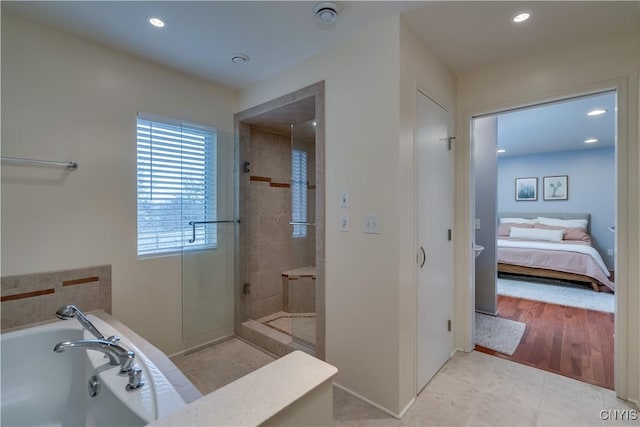 1348 Sunset Rdg, Watertown-Town, NY 13601 - bathroom featuring a garden tub, a stall shower, recessed lighting, ensuite bath, and tile patterned flooring