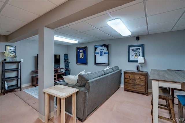 1348 Sunset Rdg, Watertown-Town, NY 13601 - living area featuring a drop ceiling and baseboards