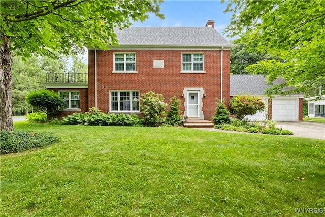 63 Chauncey Ln, Orchard Park, NY 14127 - colonial inspired home featuring a chimney, a front lawn, concrete driveway, a garage, and brick siding