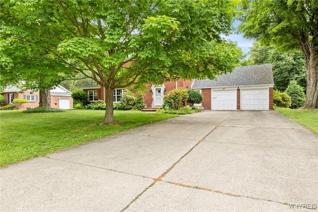 63 Chauncey Ln, Orchard Park, NY 14127 - obstructed view of property with brick siding and a front yard
