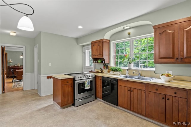63 Chauncey Ln, Orchard Park, NY 14127 - kitchen with black dishwasher, stainless steel range with electric stovetop, a peninsula, light countertops, and healthy amount of natural light