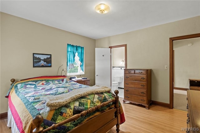 63 Chauncey Ln, Orchard Park, NY 14127 - bedroom with light wood-style floors and ensuite bathroom