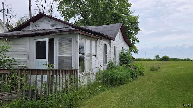 9407 Lakeshore View Rd, Sullivan, NY 13037 - view of home's exterior featuring a lawn