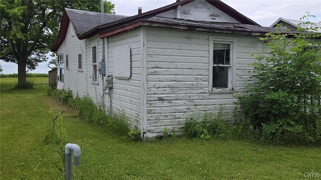 9407 Lakeshore View Rd, Sullivan, NY 13037 - view of side of home with a lawn