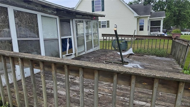 9407 Lakeshore View Rd, Sullivan, NY 13037 - wooden terrace with a sunroom