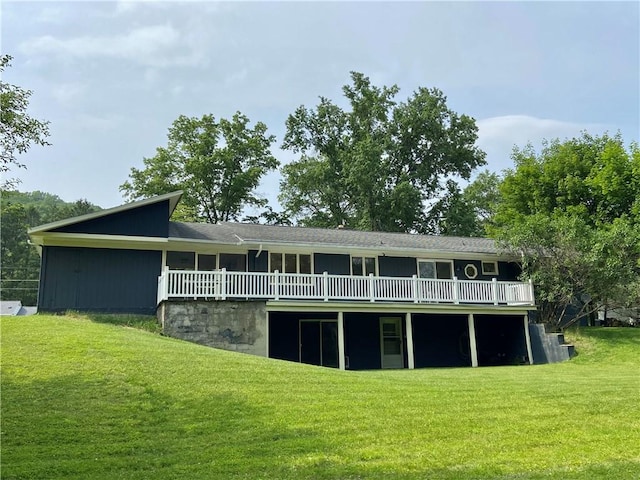 919 Fassett Rd, Elmira, NY 14905 - back of property featuring a lawn and a wooden deck