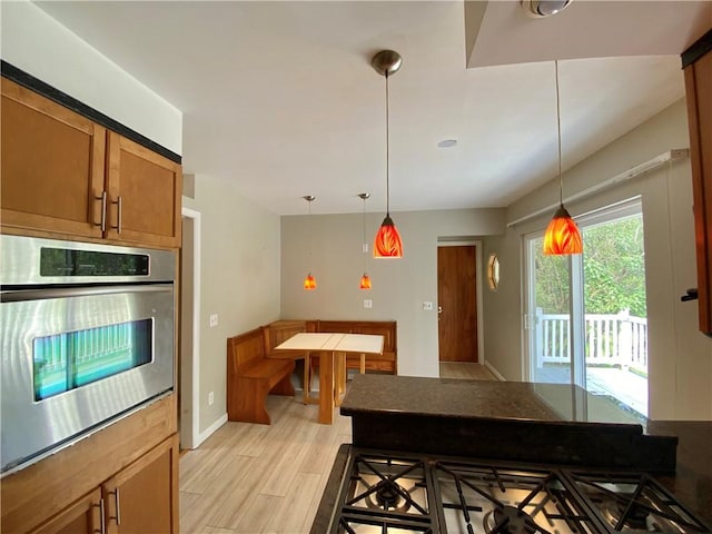 919 Fassett Rd, Elmira, NY 14905 - dining space with light wood-type flooring and baseboards