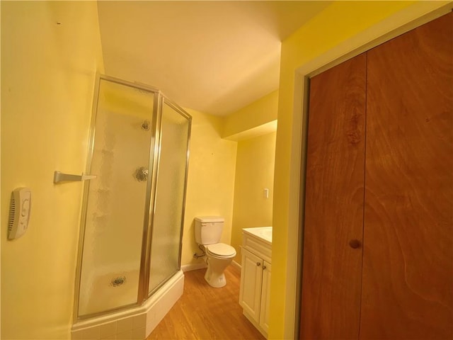 919 Fassett Rd, Elmira, NY 14905 - full bath with a stall shower, vanity, and wood finished floors