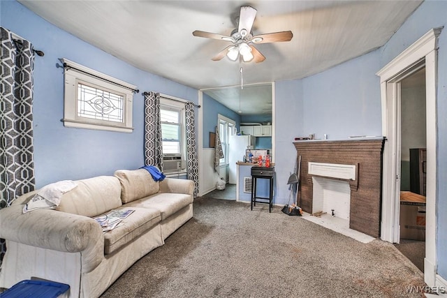 132 Ryan St, Buffalo, NY 14210 - living area featuring carpet, a ceiling fan, cooling unit, and attic access