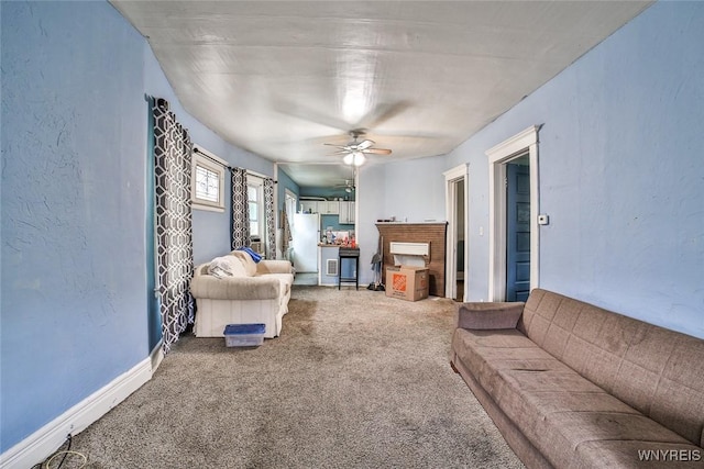 132 Ryan St, Buffalo, NY 14210 - living area with carpet and a ceiling fan