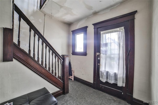132 Ryan St, Buffalo, NY 14210 - carpeted foyer with stairway and baseboards