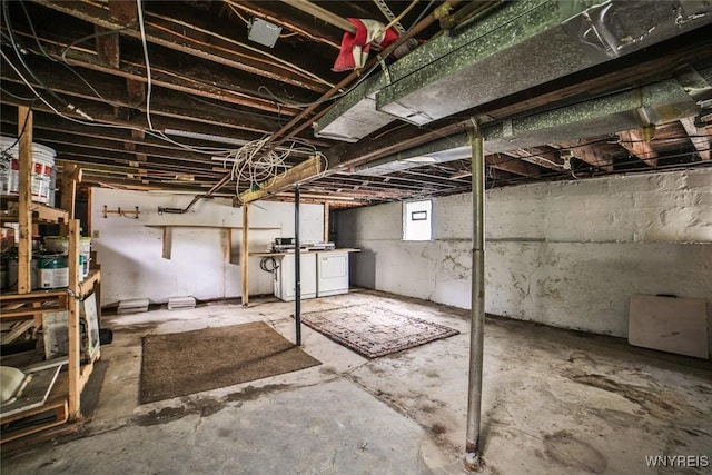132 Ryan St, Buffalo, NY 14210 - below grade area with washer and clothes dryer