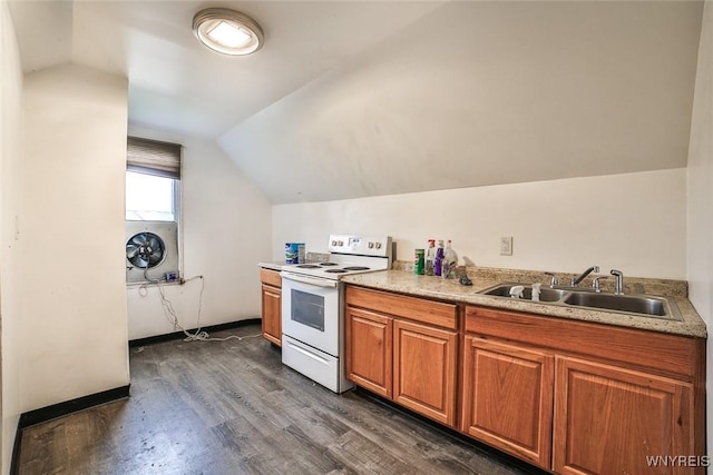 132 Ryan St, Buffalo, NY 14210 - kitchen with white electric range, dark wood-style floors, lofted ceiling, brown cabinets, and light countertops