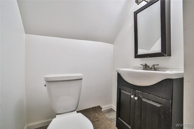 132 Ryan St, Buffalo, NY 14210 - half bath featuring vanity and lofted ceiling