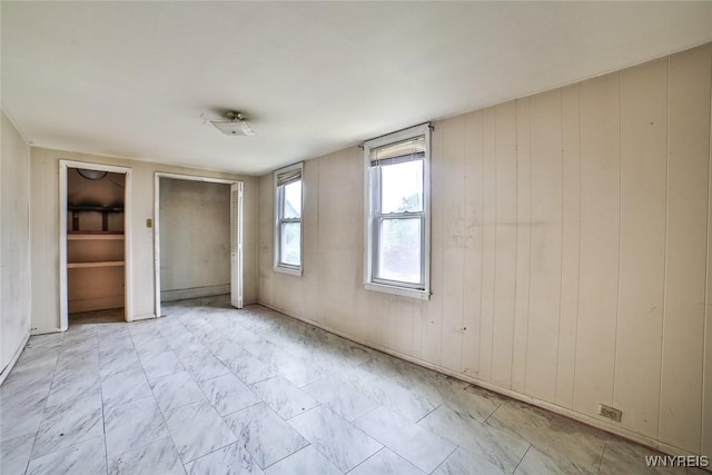 132 Ryan St, Buffalo, NY 14210 - unfurnished bedroom featuring two closets