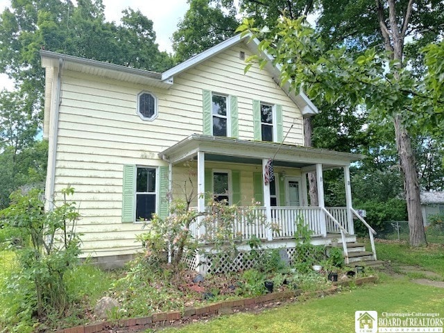 3 Jaekle Ave, Hanover, NY 14136 - view of front of property featuring a porch and a front yard