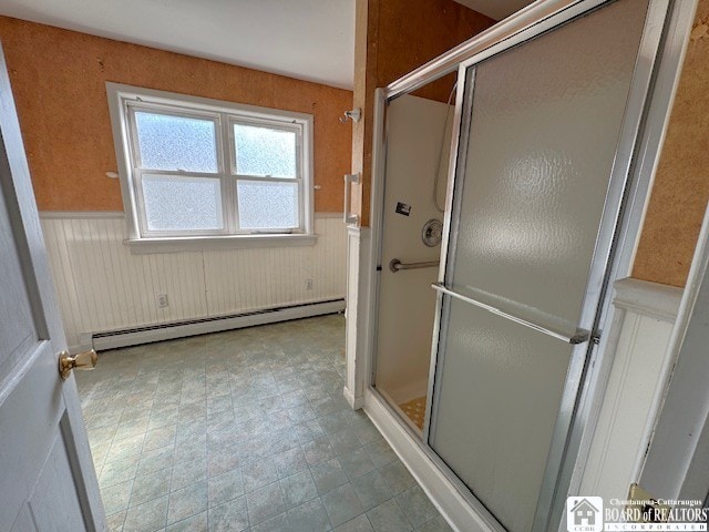 3 Jaekle Ave, Hanover, NY 14136 - full bathroom with baseboard heating, a wainscoted wall, and a stall shower