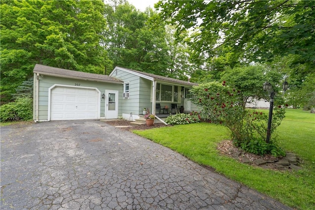 207 County Road 7, Manchester, NY 14432 - view of front of home with a garage, a front lawn, and driveway