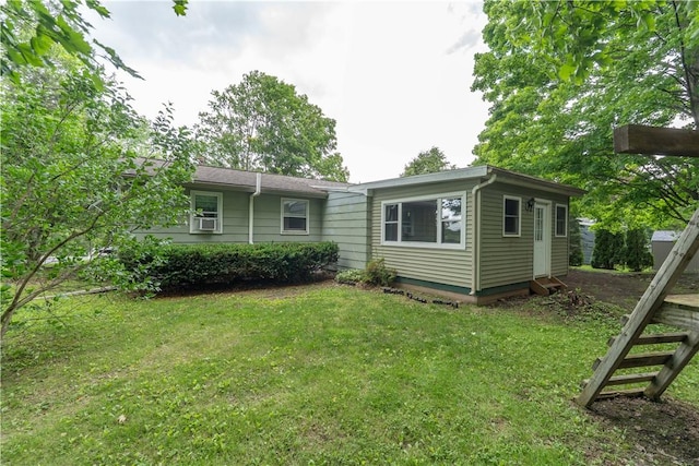 207 County Road 7, Manchester, NY 14432 - back of house featuring a lawn and cooling unit