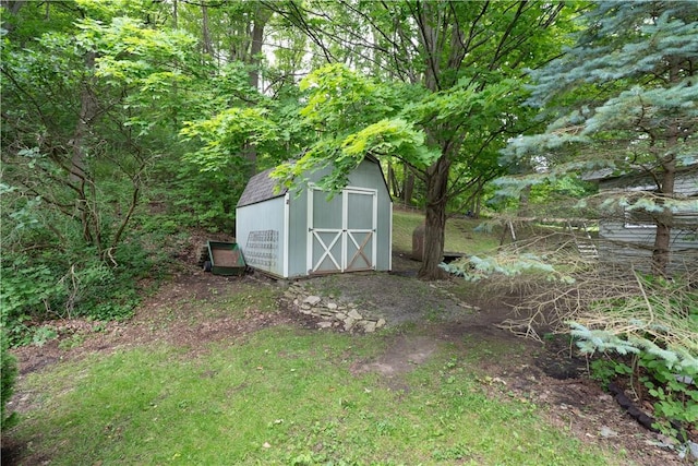 207 County Road 7, Manchester, NY 14432 - view of shed with a wooded view