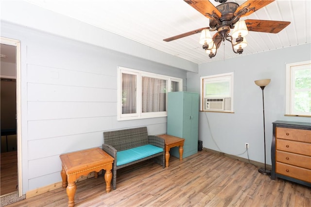 207 County Road 7, Manchester, NY 14432 - living area featuring cooling unit, ceiling fan, and light wood finished floors