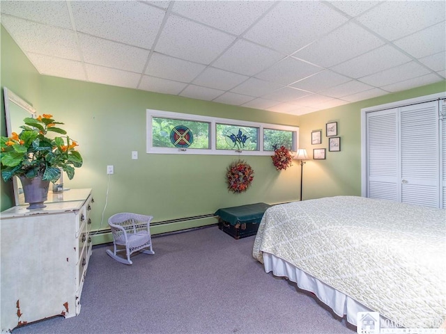 4627 Anderson Dr, Ellery, NY 14712 - bedroom featuring a baseboard heating unit, carpet flooring, a paneled ceiling, a baseboard radiator, and a closet