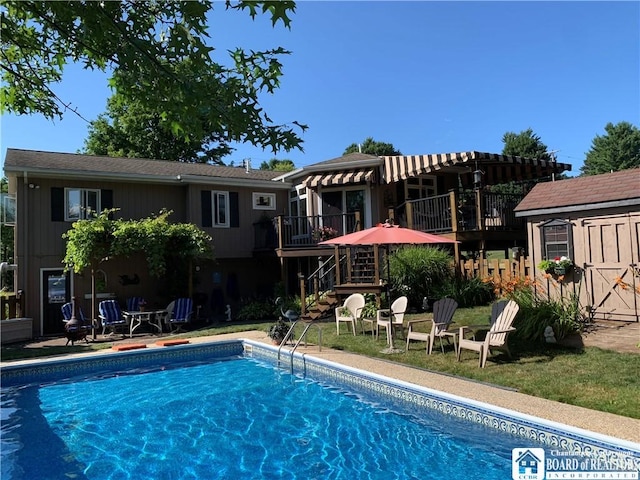 4627 Anderson Dr, Ellery, NY 14712 - outdoor pool featuring a storage unit, stairs, and a deck