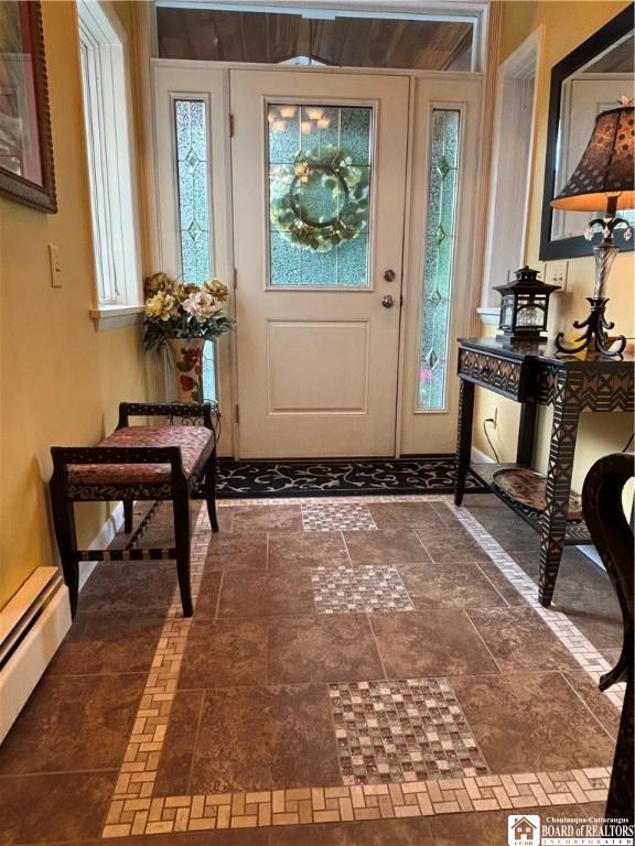 4627 Anderson Dr, Ellery, NY 14712 - entryway featuring a baseboard radiator, plenty of natural light, and stone finish floors