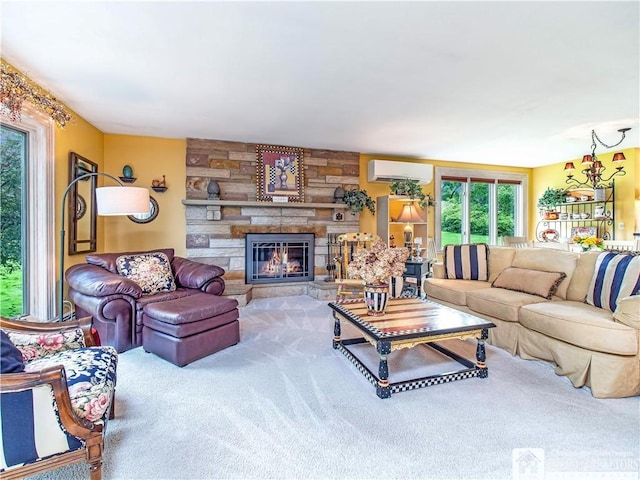 4627 Anderson Dr, Ellery, NY 14712 - carpeted living room with a wall mounted AC, healthy amount of natural light, and a fireplace