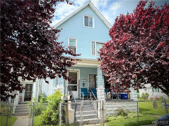 134 Hamburg St, Buffalo, NY 14204 - view of front of home featuring covered porch, a gate, and a fenced front yard